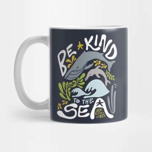 Ocean Harmony: Majestic Blue Whale and Playful Dolphin with the Message 'Be Kind to the Sea' Mug